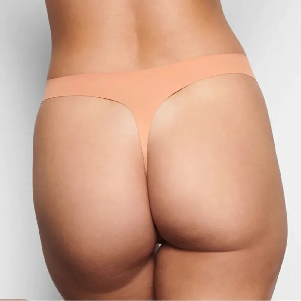 NWT SKIMS Naked Dipped Seamless Thong In Nude Ochre Panty